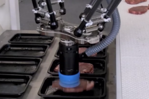 Vacuum end effector for meat handling